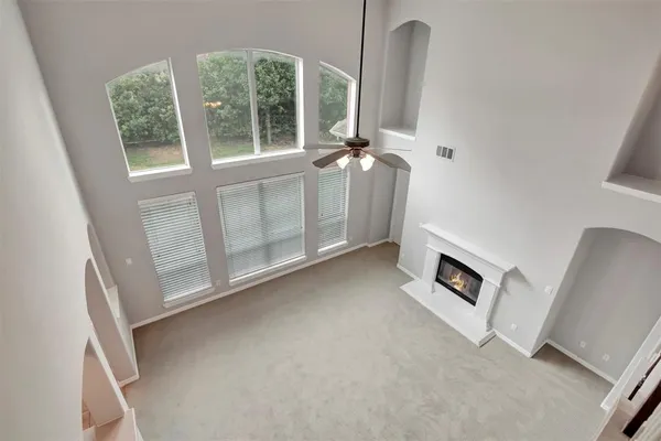 a view of a livingroom with furniture and window