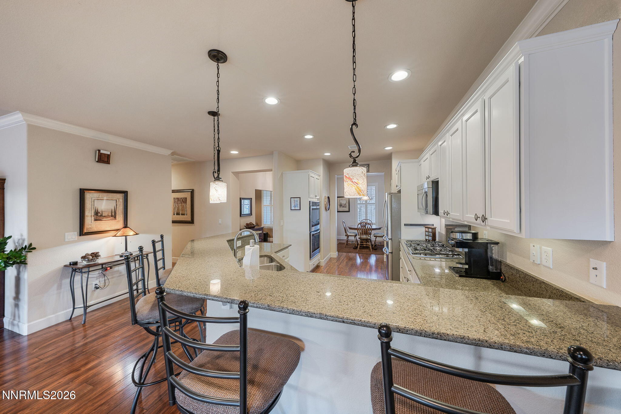 9370 Rockhurst Court Reno, NV 89523 - Photo 14 of 40 outdoor kitchen with lots of counter space dining table and chairs