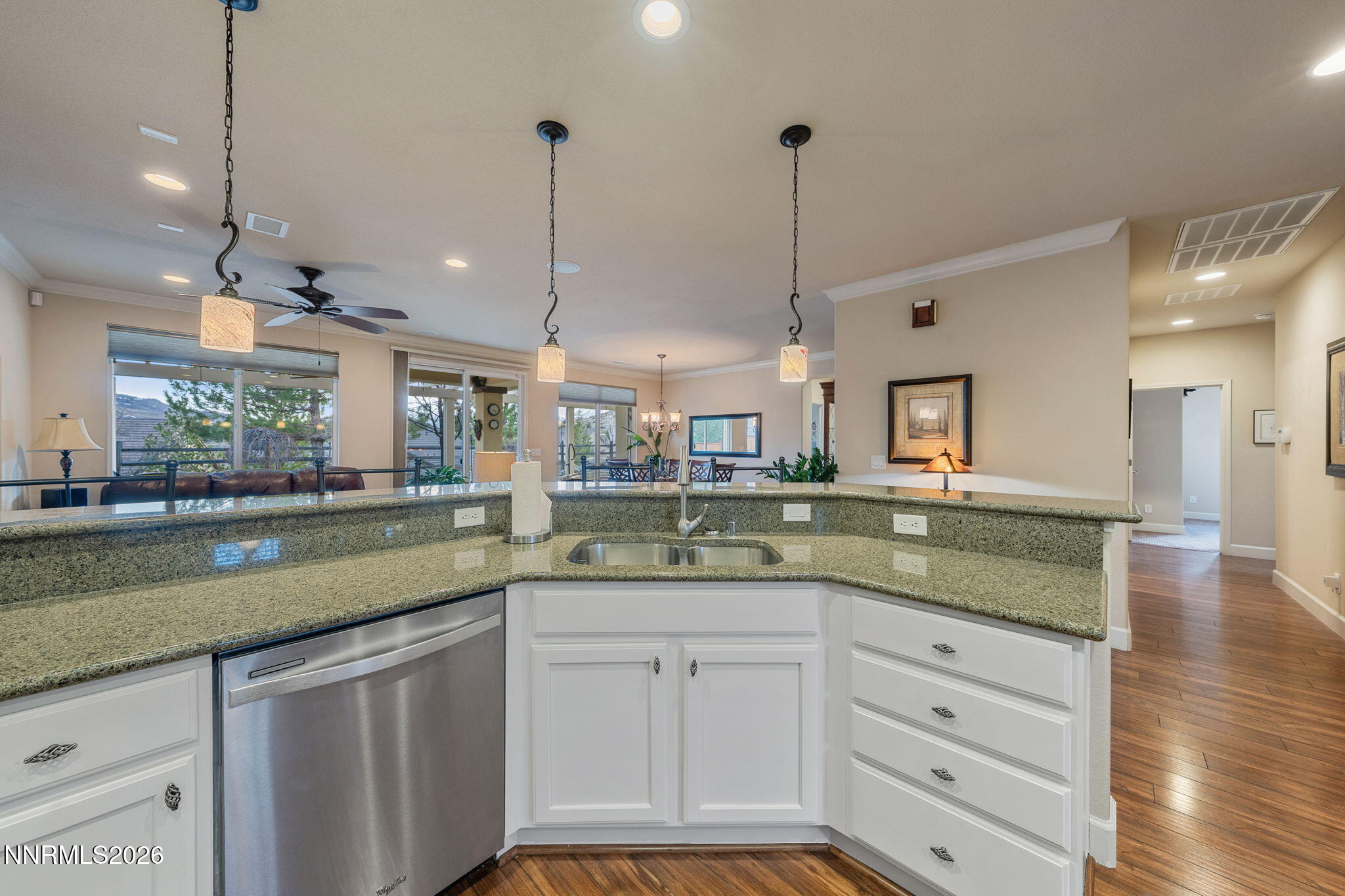 9370 Rockhurst Court Reno, NV 89523 - Photo 15 of 40 a kitchen with a sink a counter space appliances and cabinets