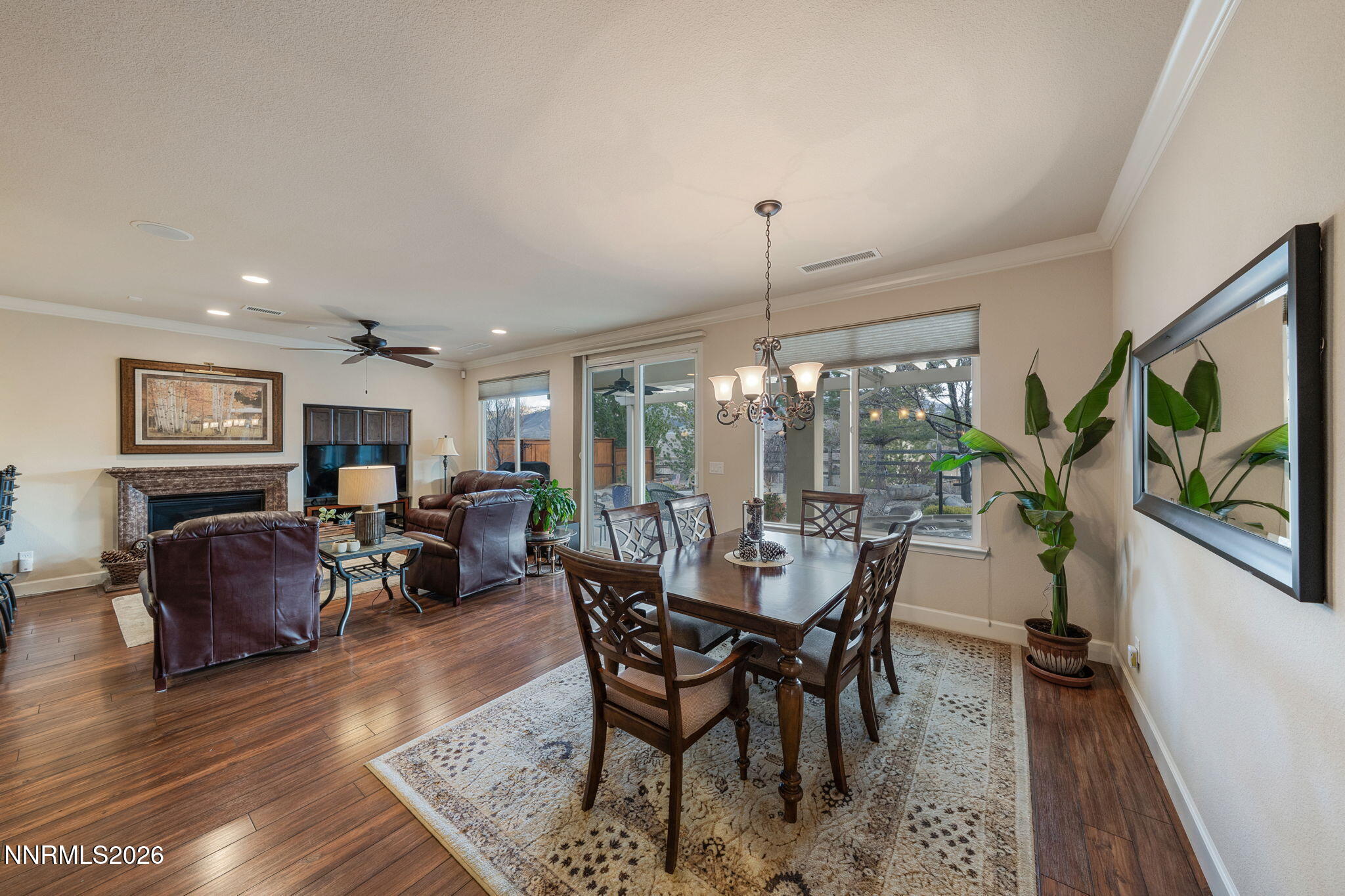 9370 Rockhurst Court Reno, NV 89523 - Photo 21 of 40 a view of a dining room with furniture window and wooden floor