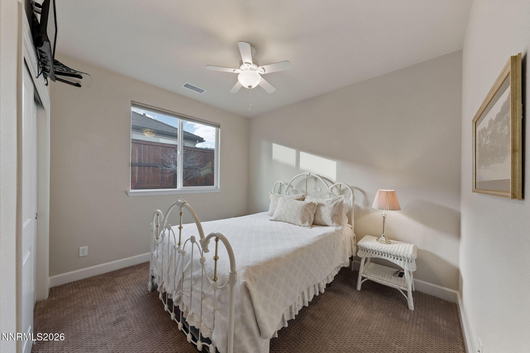 9370 Rockhurst Court Reno, NV 89523 - Photo 31 of 40 a bedroom with bed and window