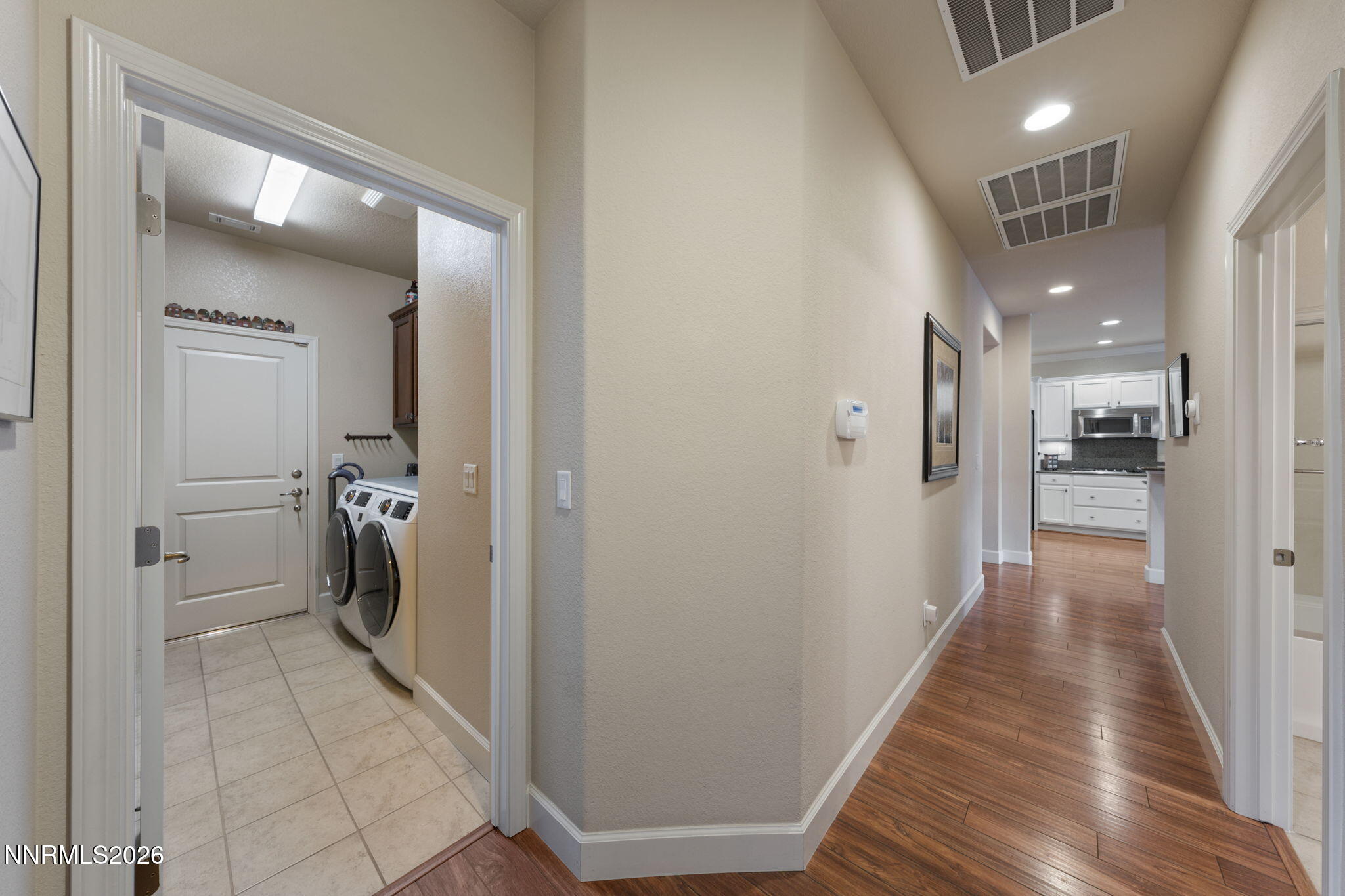 9370 Rockhurst Court Reno, NV 89523 - Photo 33 of 40 a view of a hallway with a wooden floor