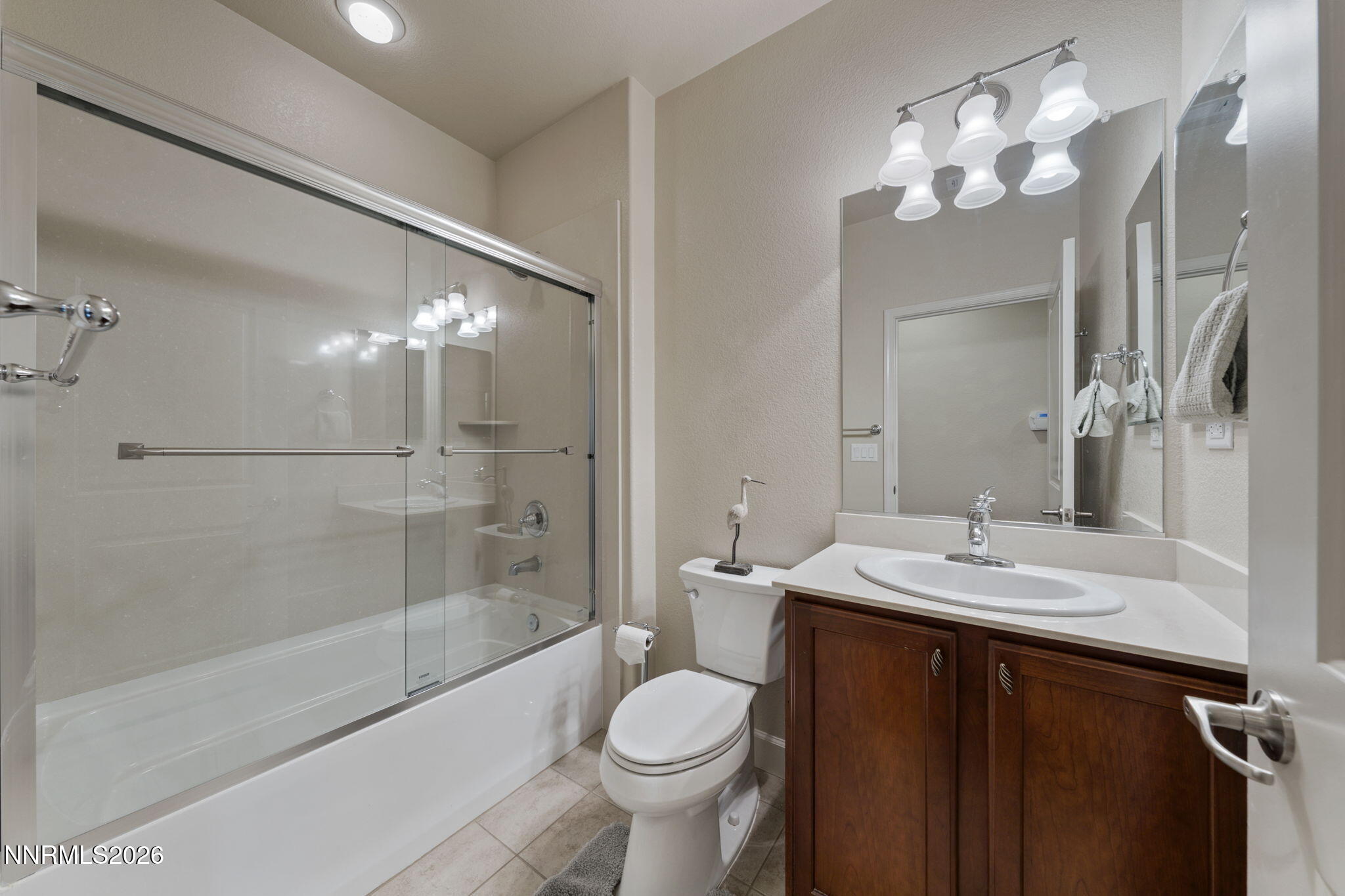 9370 Rockhurst Court Reno, NV 89523 - Photo 35 of 40 a bathroom with a sink a toilet and shower