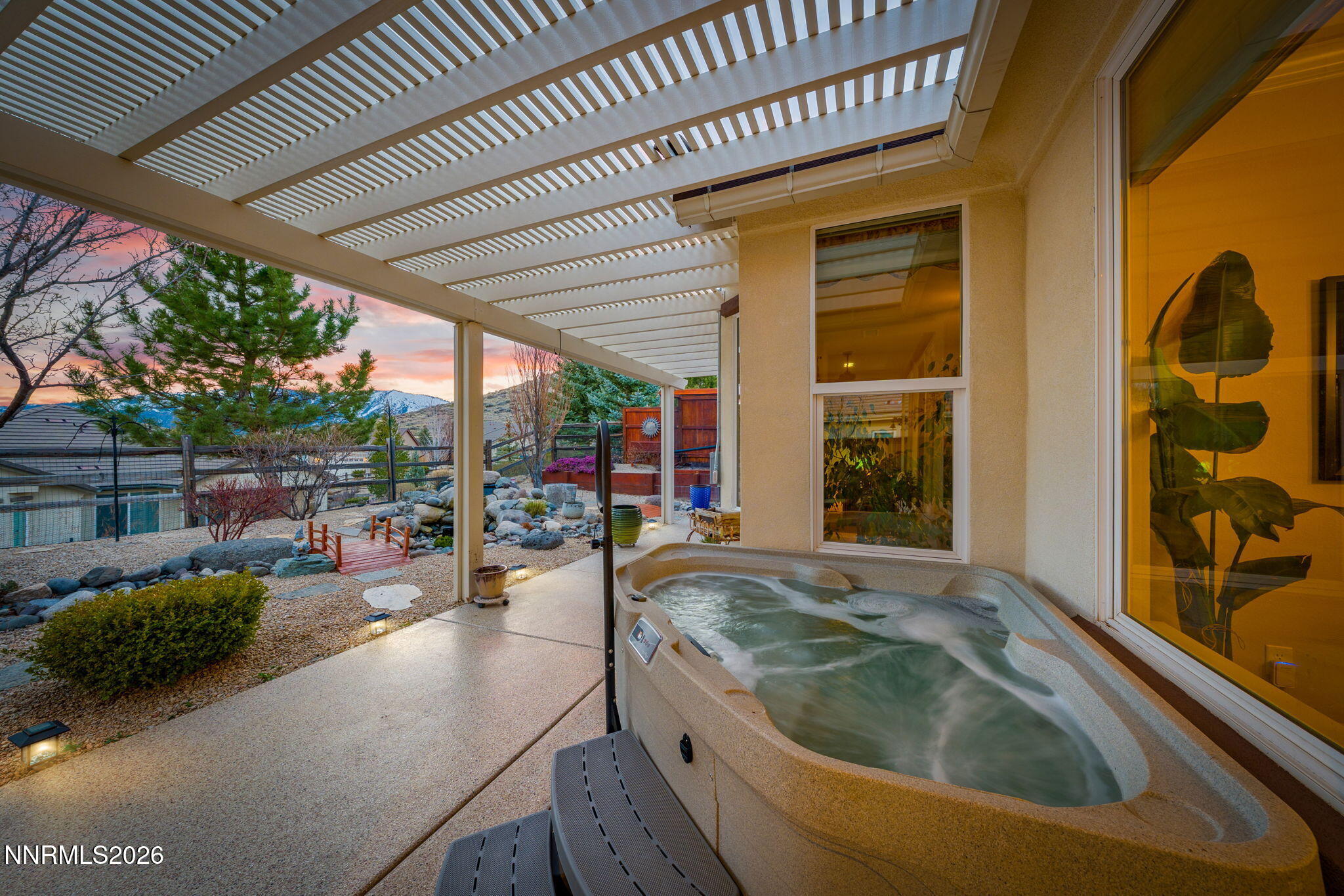 9370 Rockhurst Court Reno, NV 89523 - Photo 4 of 40 a swimming pool with outdoor seating and yard