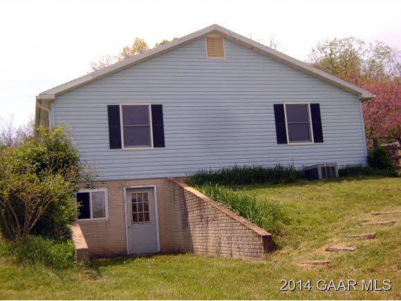 3694 Shutterlee Mill Road Staunton, VA 24401 - Photo 3 of 17 a front view of a house with garden