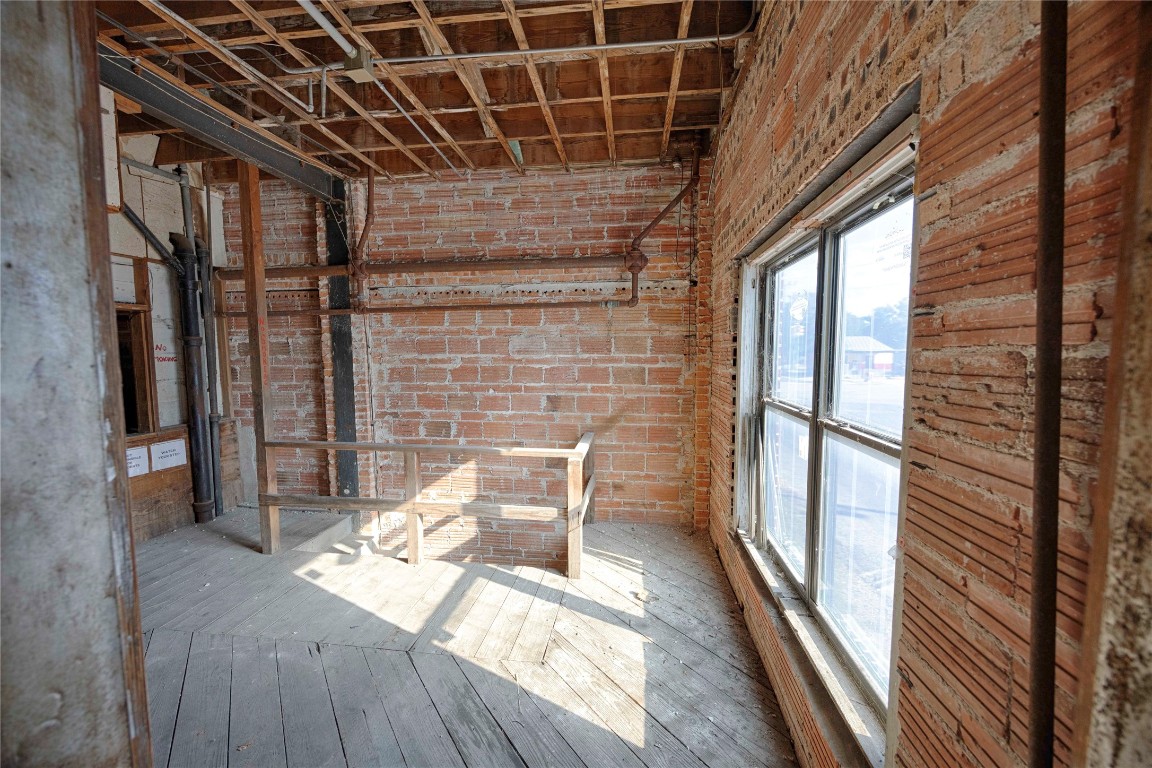 607 Lyons Avenue Schulenburg, TX 78956 - Photo 17 of 27 a view of chairs in wooden deck