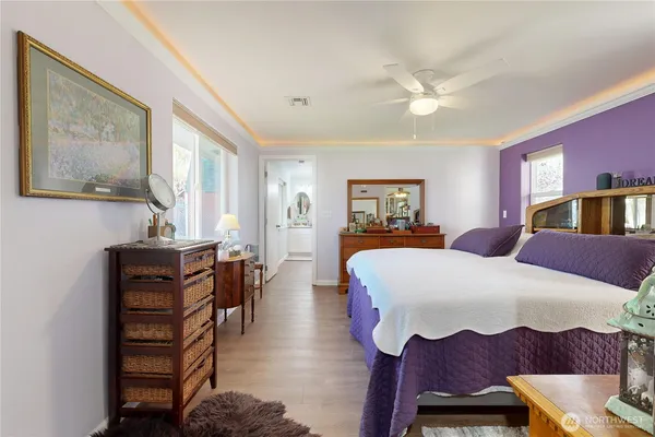 a bathroom with a double vanity sink and mirror