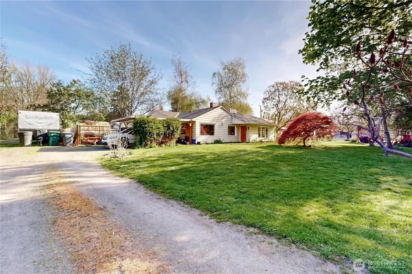 a view of a playground with basketball court