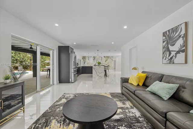 a living room with furniture and a table