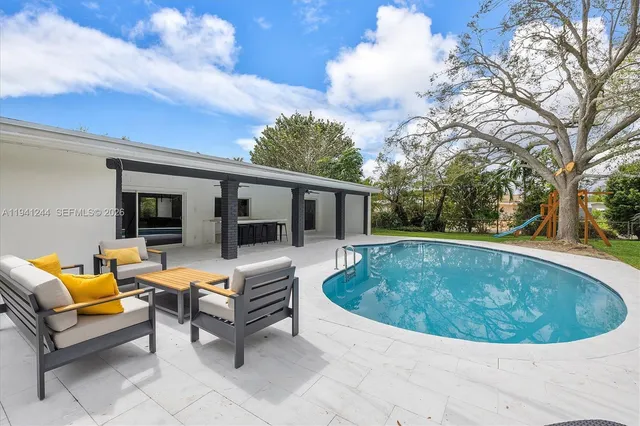 a view of outdoor space yard swimming pool and patio
