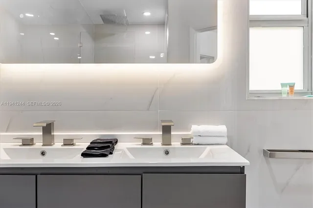 a bathroom with a sink and a toilet