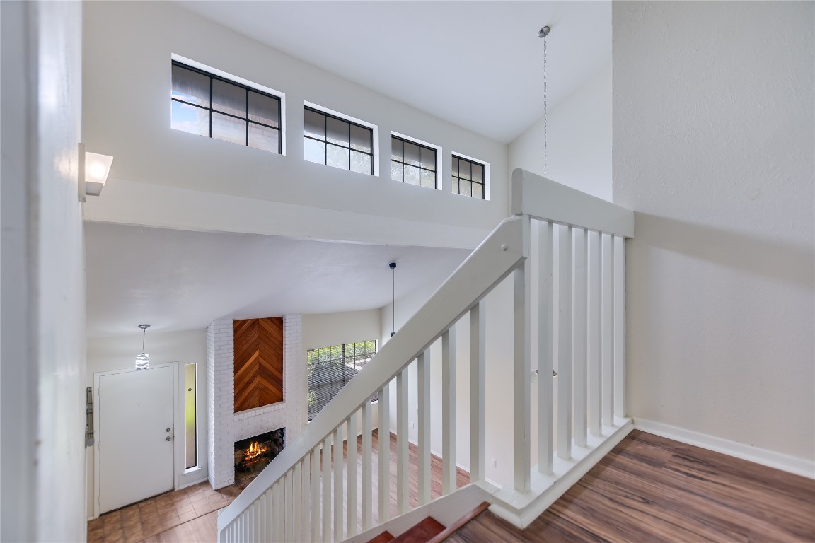 1748 Ohlen Road, Unit 36 Austin, TX 78757 - Photo 11 of 21 a view of entryway and hall with wooden floor