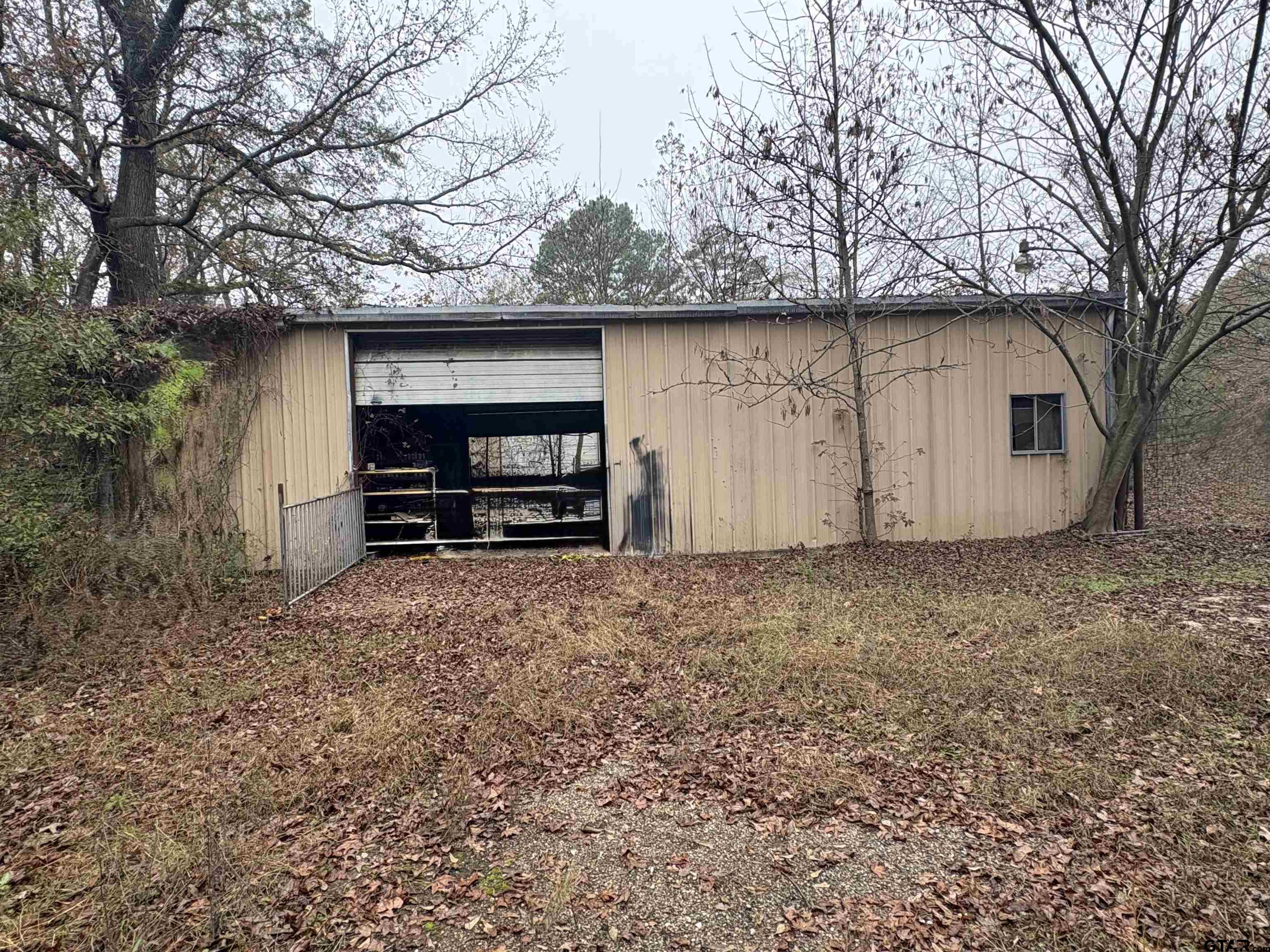 a house with trees in the background