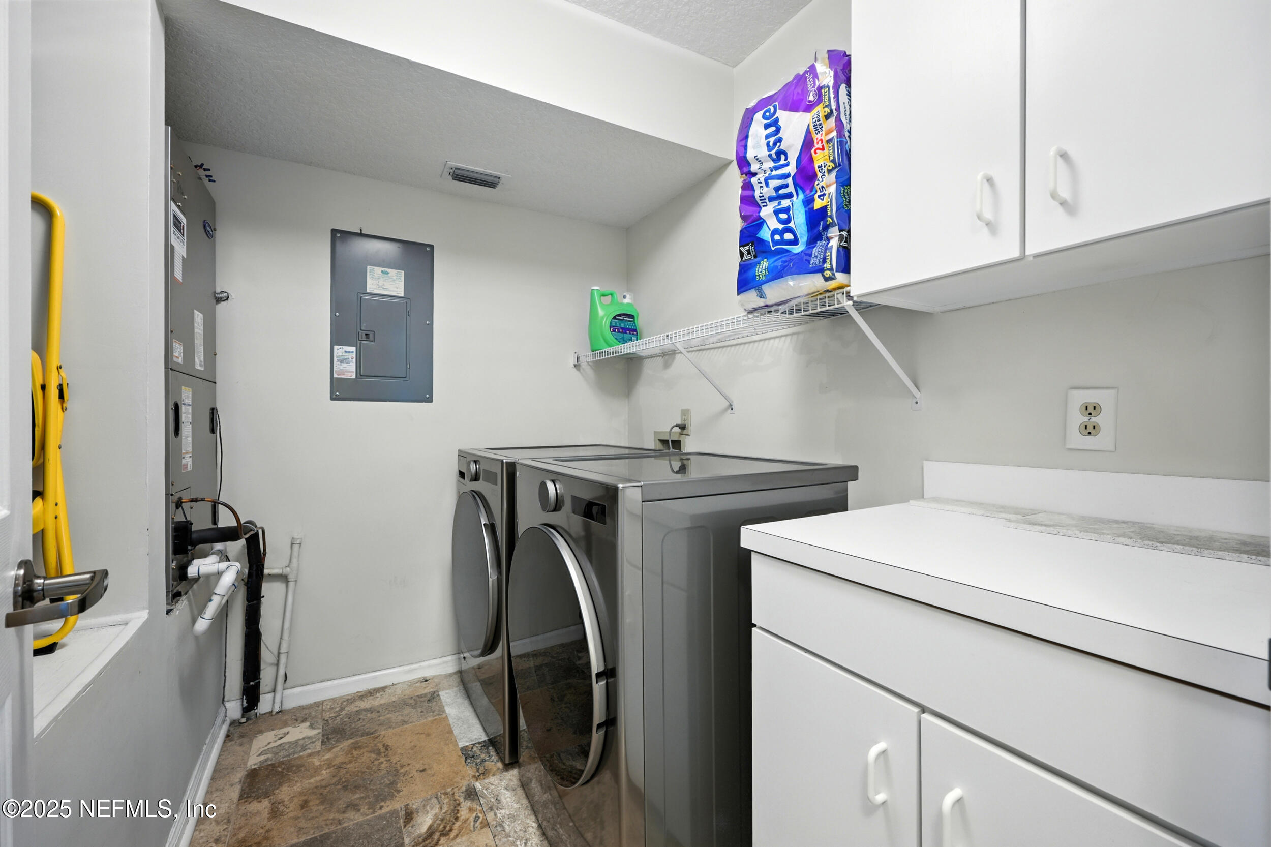 3331 Lighthouse Point Lane Jacksonville, FL 32250 - Photo 35 of 63 a utility room with dryer and washer