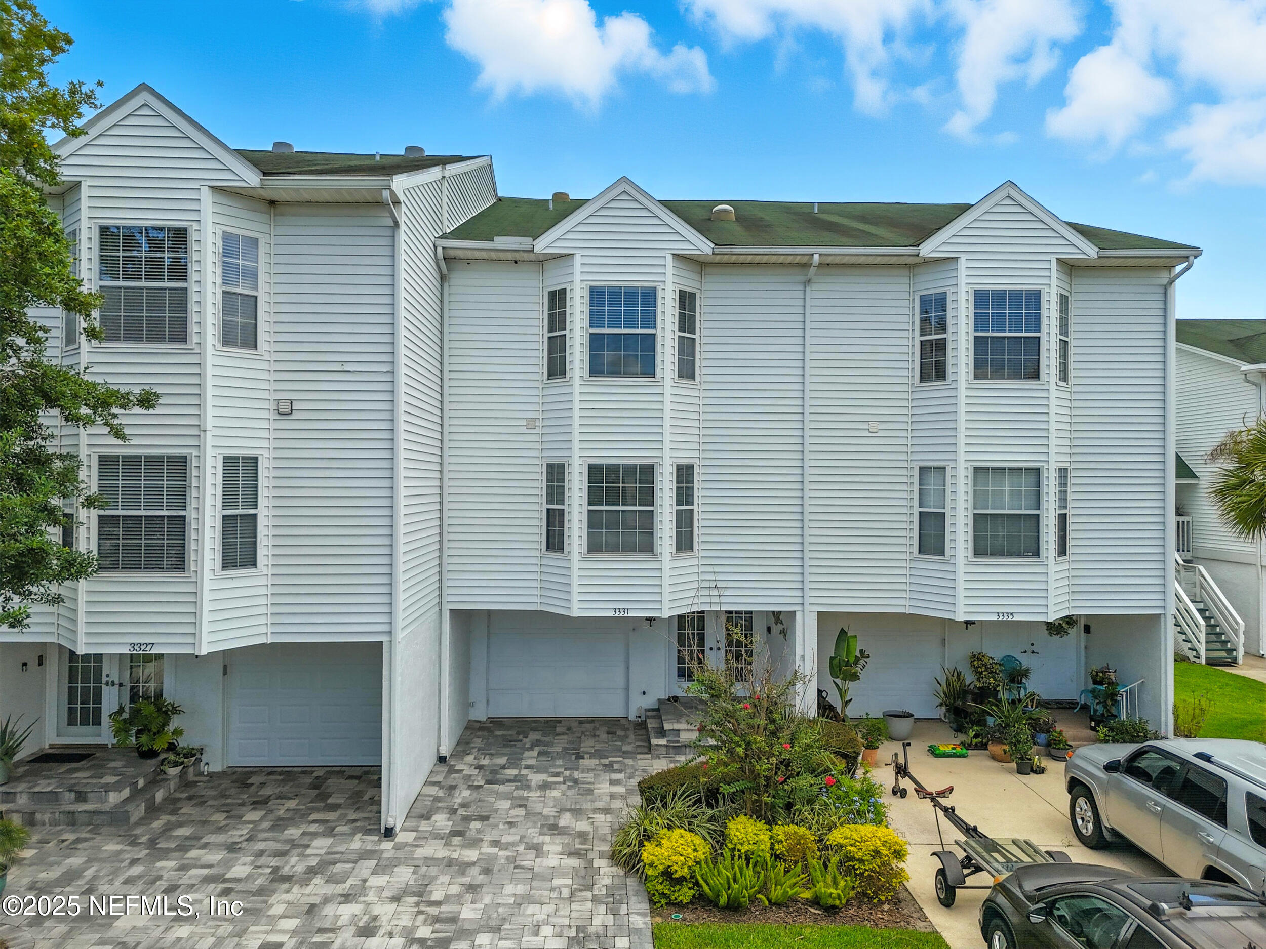 3331 Lighthouse Point Lane Jacksonville, FL 32250 - Photo 43 of 63 a front view of a building with balcony