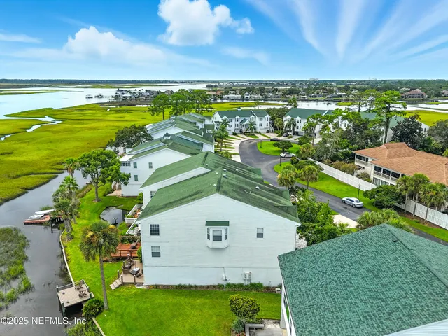 a view of swimming pool with outdoor seating and yard in back