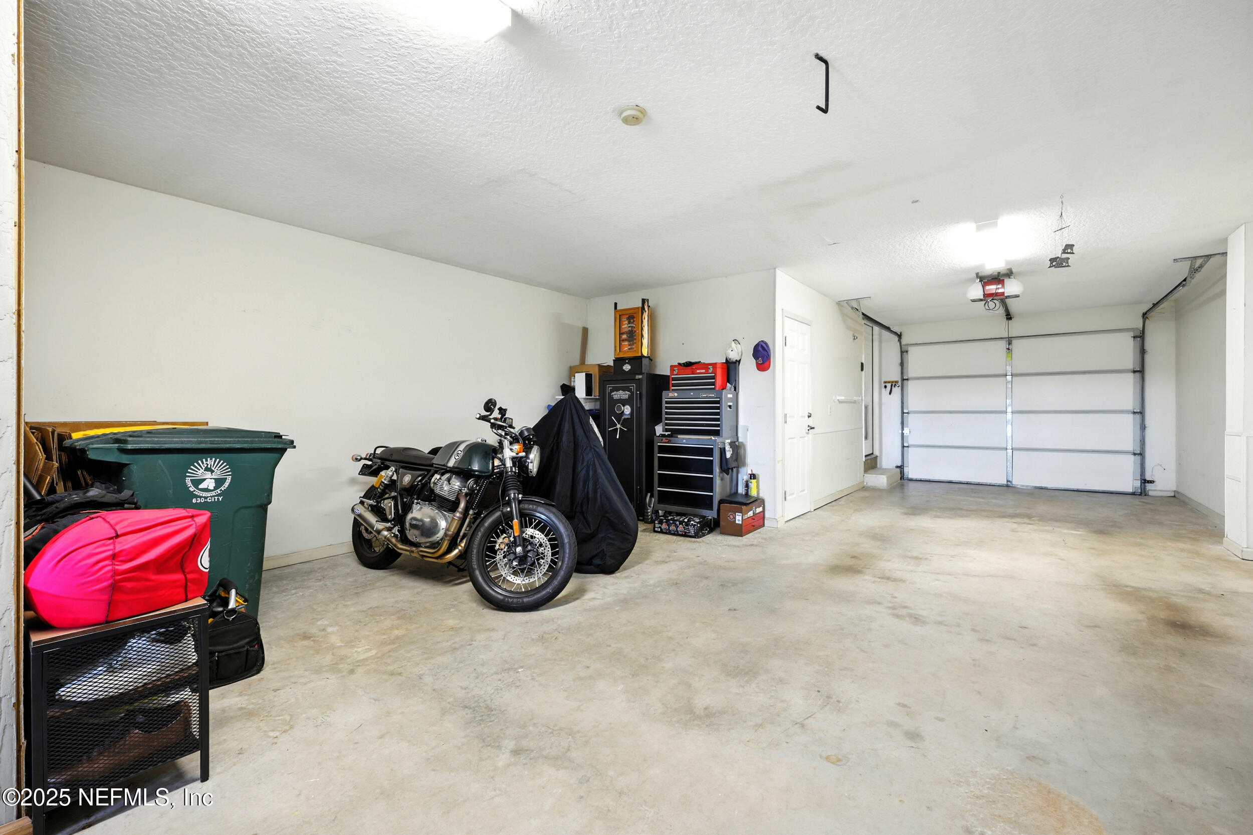 3331 Lighthouse Point Lane Jacksonville, FL 32250 - Photo 45 of 63 a view of a garage with storage