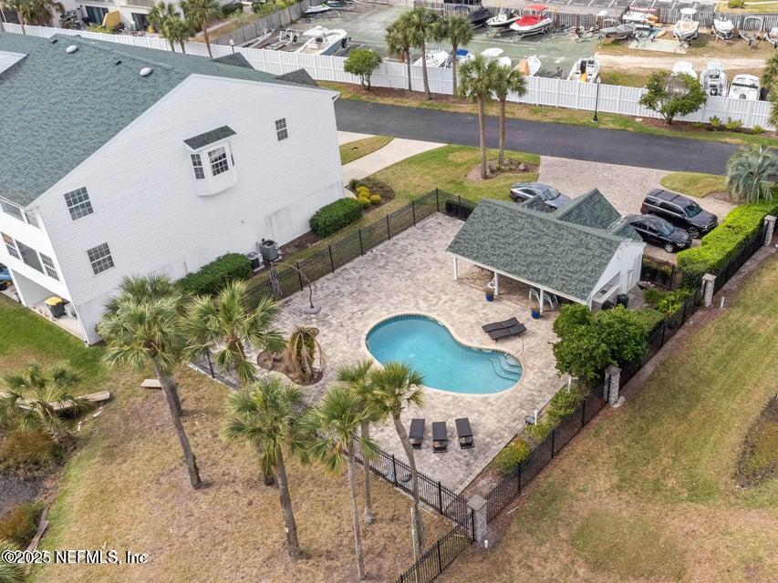 3331 Lighthouse Point Lane Jacksonville, FL 32250 - Photo 46 of 63 an aerial view of a house with a swimming pool