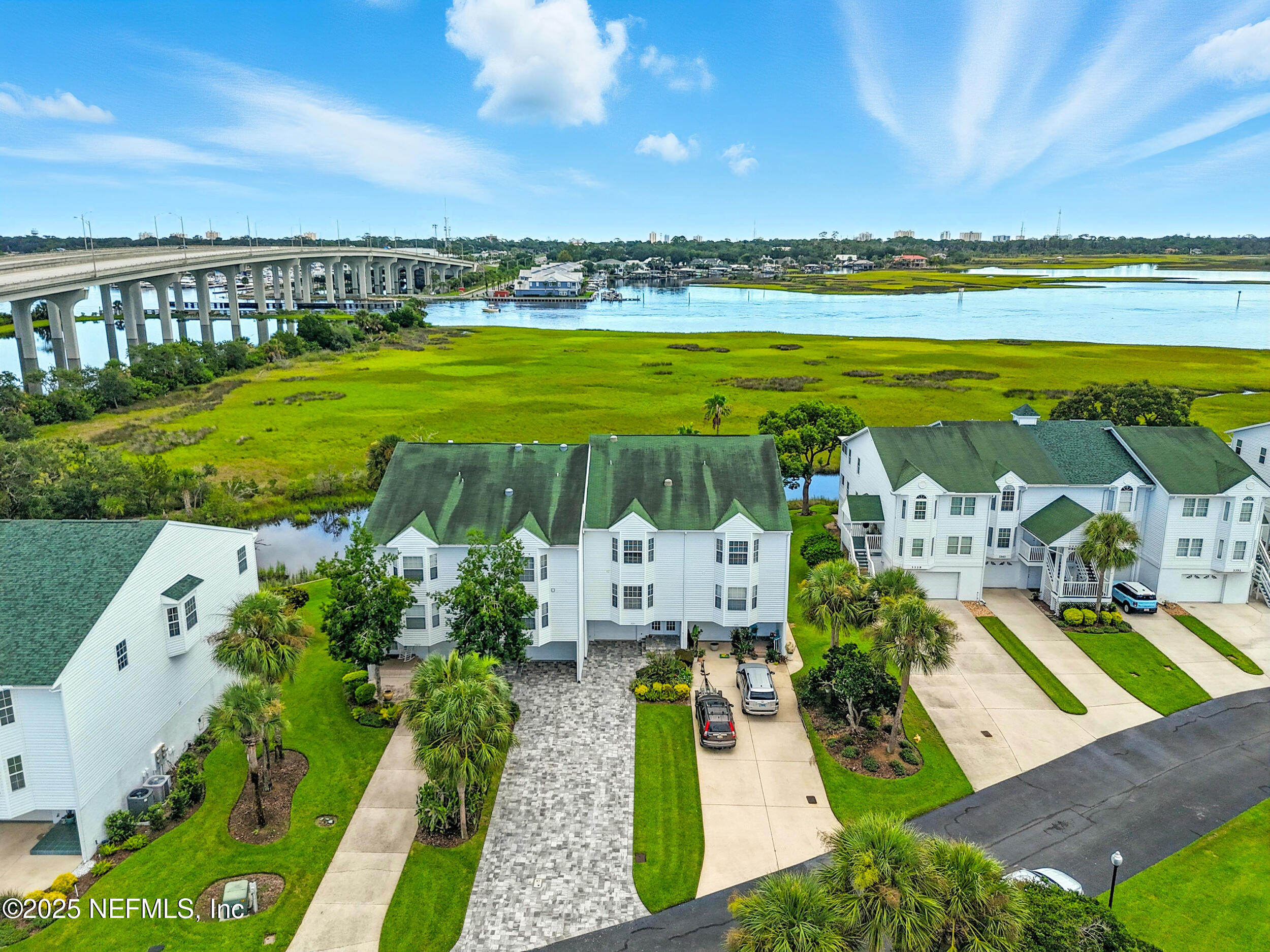 3331 Lighthouse Point Lane Jacksonville, FL 32250 - Photo 47 of 63 a view of a city with lawn chairs
