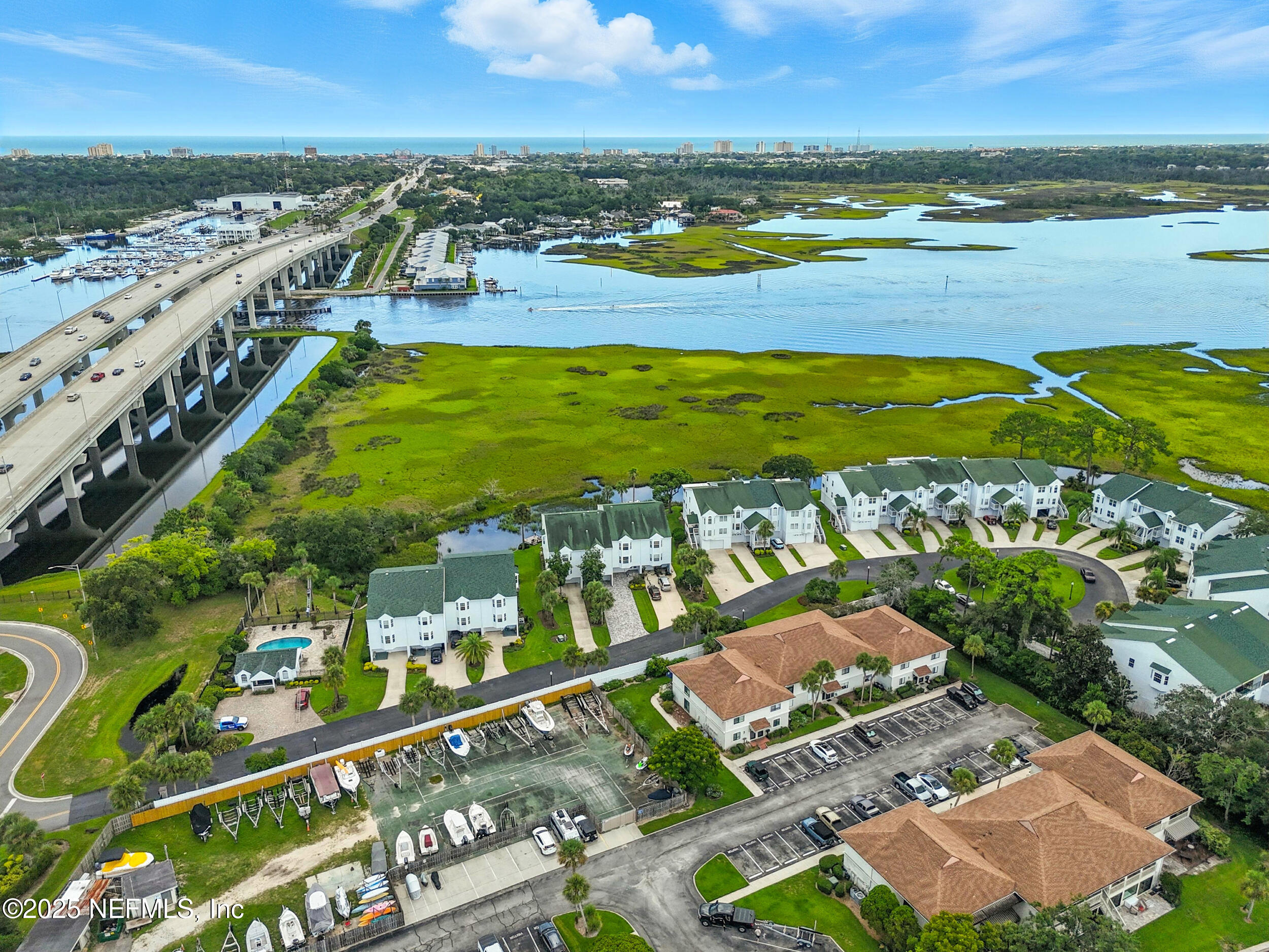 3331 Lighthouse Point Lane Jacksonville, FL 32250 - Photo 52 of 63 a view of a city with an ocean