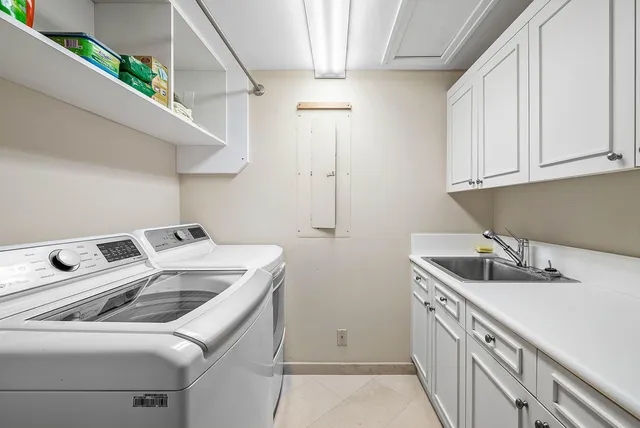 a view of a large building with a glass door