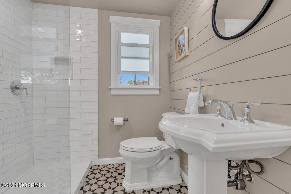 2117 Murray Road Point Pleasant, NJ 08742 - Photo 15 of 35 a bathroom with a sink a toilet and shower