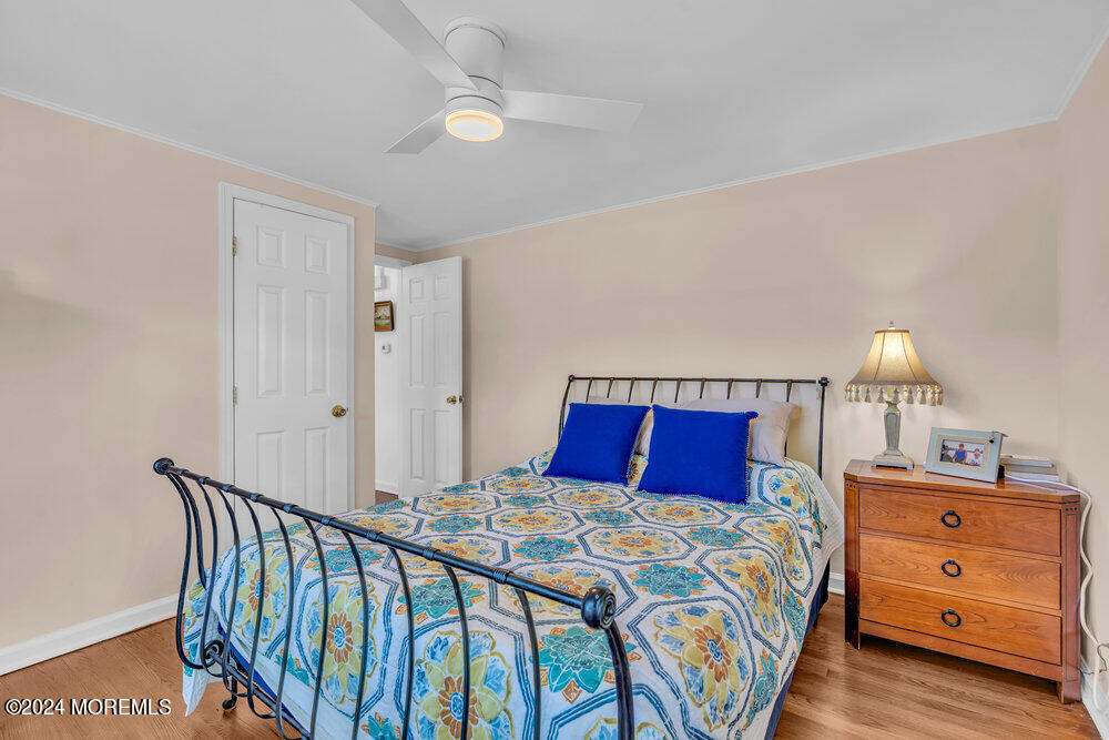 2117 Murray Road Point Pleasant, NJ 08742 - Photo 16 of 35 a bedroom with a bed and a dresser