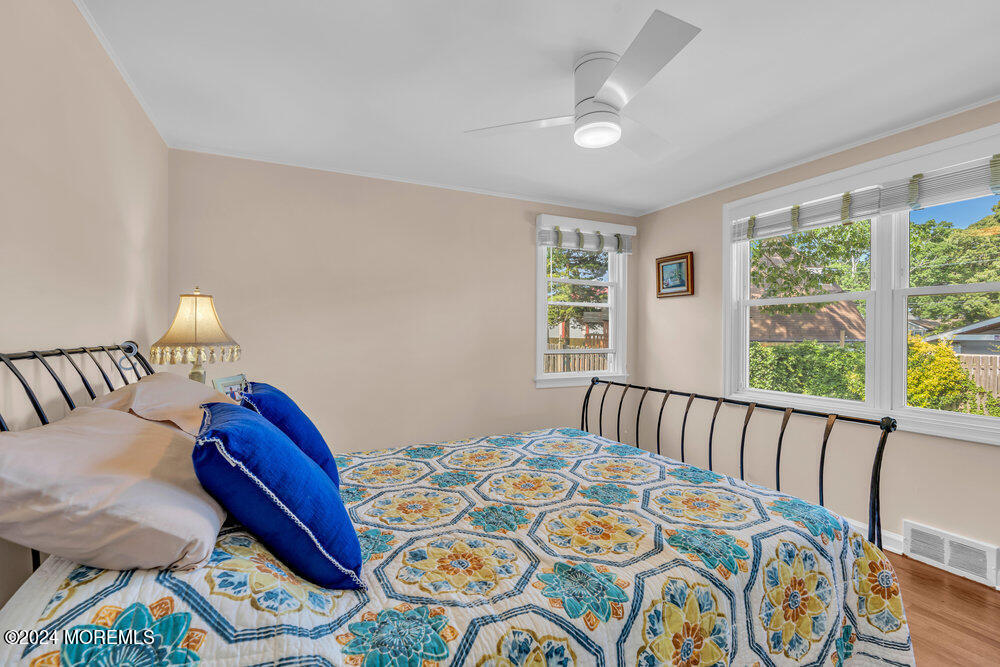 2117 Murray Road Point Pleasant, NJ 08742 - Photo 17 of 35 a bedroom with a bed and a window