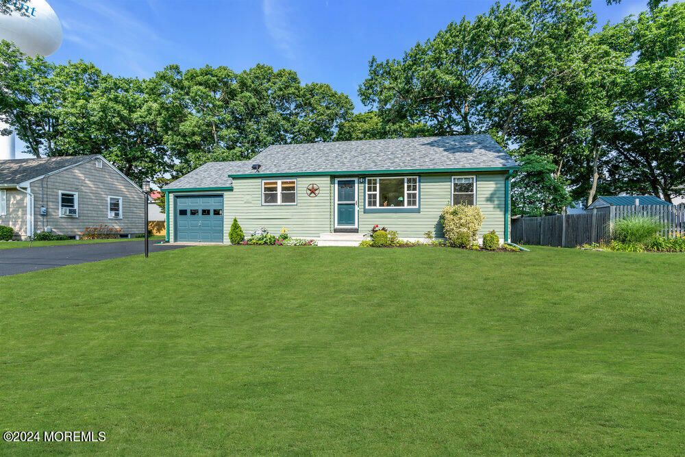 2117 Murray Road Point Pleasant, NJ 08742 - Photo 18 of 35 a front view of a house with garden