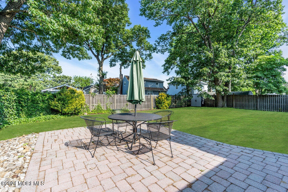 2117 Murray Road Point Pleasant, NJ 08742 - Photo 24 of 35 a view of a backyard with sitting area