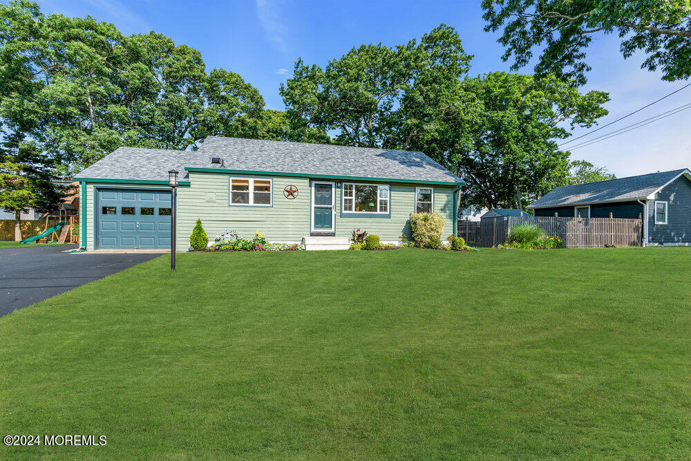 2117 Murray Road Point Pleasant, NJ 08742 - Photo 29 of 35 a front view of a house with garden