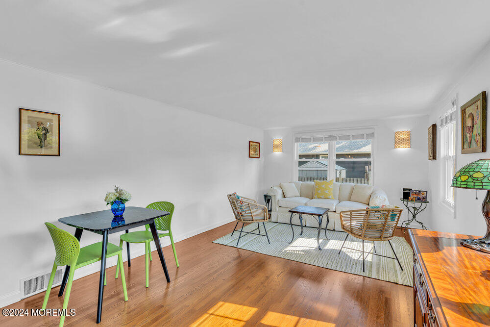 2117 Murray Road Point Pleasant, NJ 08742 - Photo 4 of 35 a view of a dining room with furniture and wooden floor