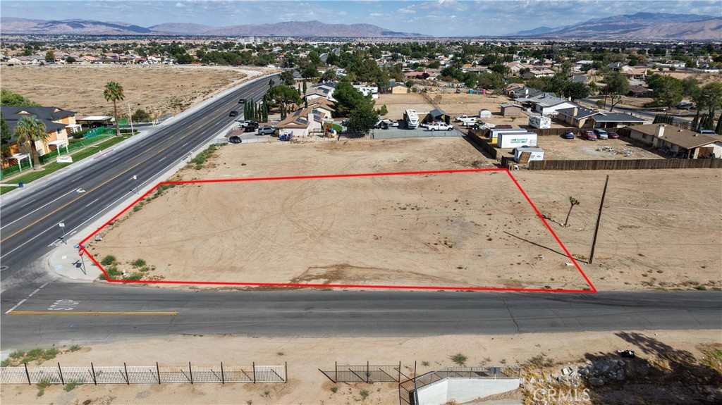 0 Nisqualli Road Victorville, CA 92395 - Photo 2 of 10 a view of a terrace with a lake