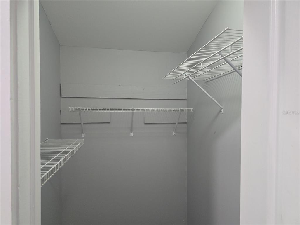 326 Southeast 2nd Street Williston, FL 32696 - Photo 20 of 30 a view of a room with racks on the wall