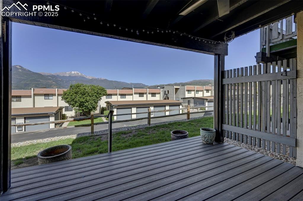 910 Fontmore Road, Unit B Colorado Springs, CO 80904 - Photo 24 of 32 a view of a balcony with wooden floor