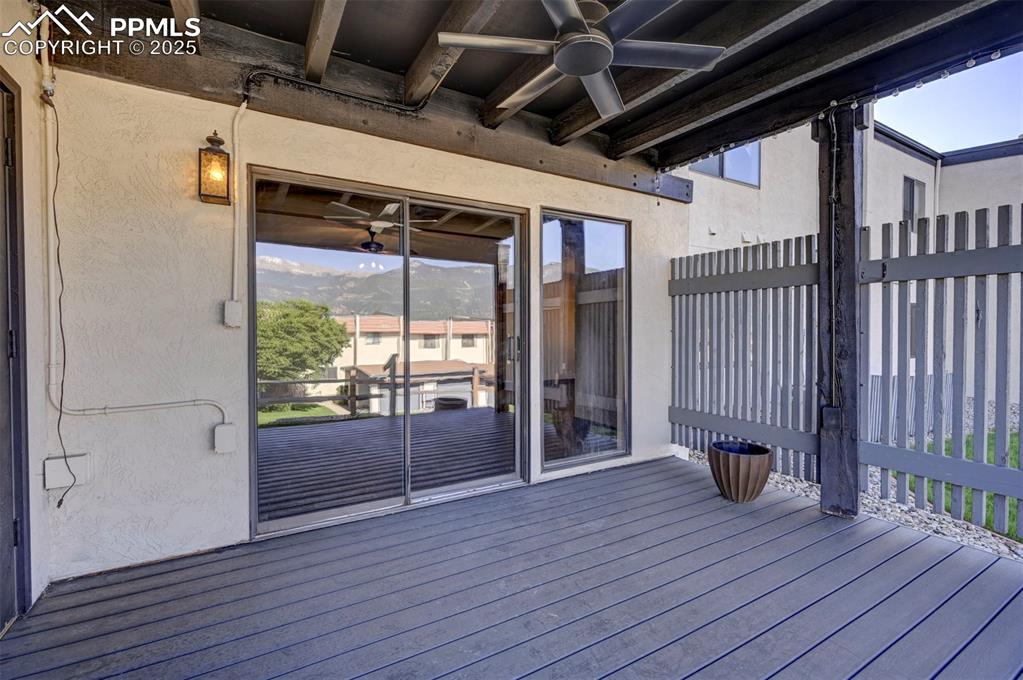 910 Fontmore Road, Unit B Colorado Springs, CO 80904 - Photo 26 of 32 a view of an empty room with wooden floor