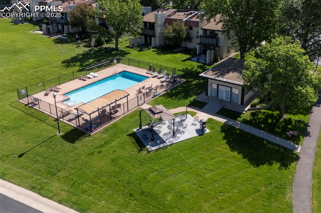 910 Fontmore Road, Unit B Colorado Springs, CO 80904 - Photo 27 of 32 a view of a backyard with plants and outdoor seating