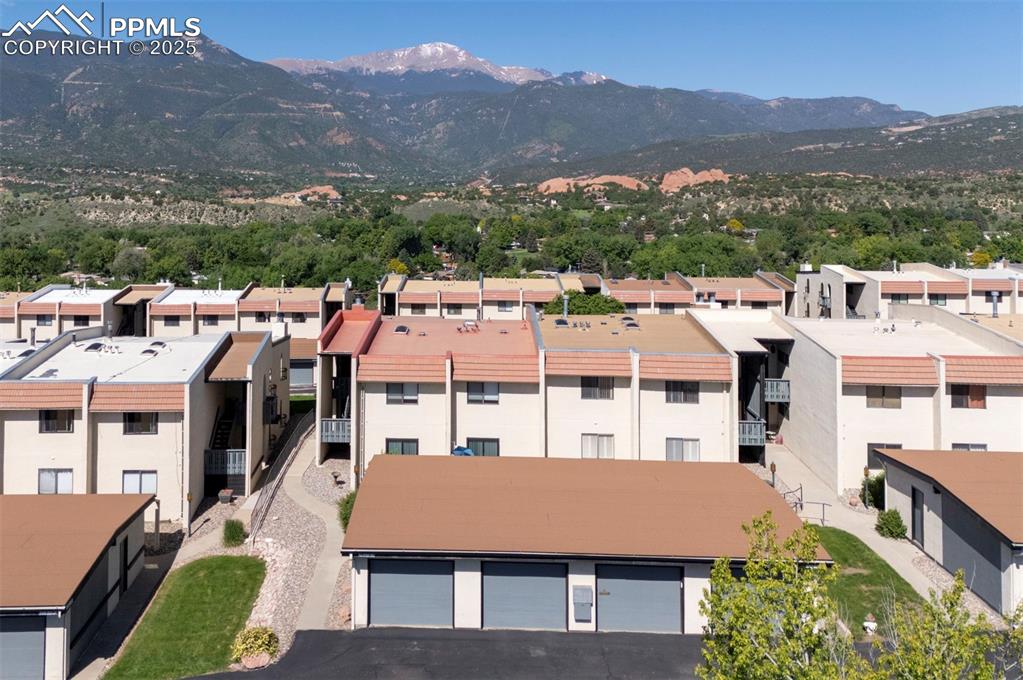 910 Fontmore Road, Unit B Colorado Springs, CO 80904 - Photo 31 of 32 a aerial view of a town with mountains in the background