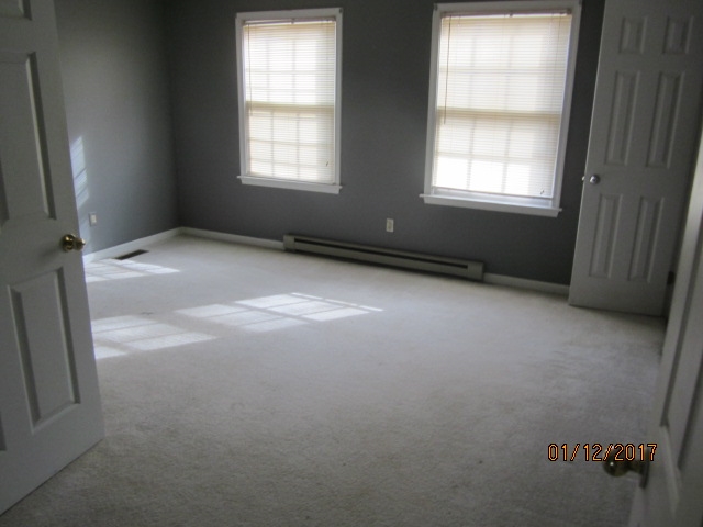 760 Buttermilk Spring Road Staunton, VA 24401 - Photo 12 of 20 an empty room with windows