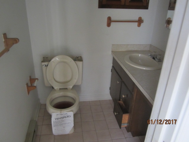 760 Buttermilk Spring Road Staunton, VA 24401 - Photo 14 of 20 a bathroom with a toilet and a sink