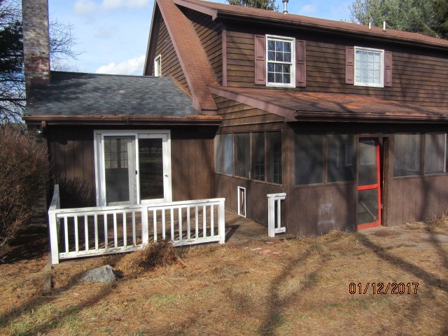 760 Buttermilk Spring Road Staunton, VA 24401 - Photo 2 of 20 a backyard of a house with table and chairs