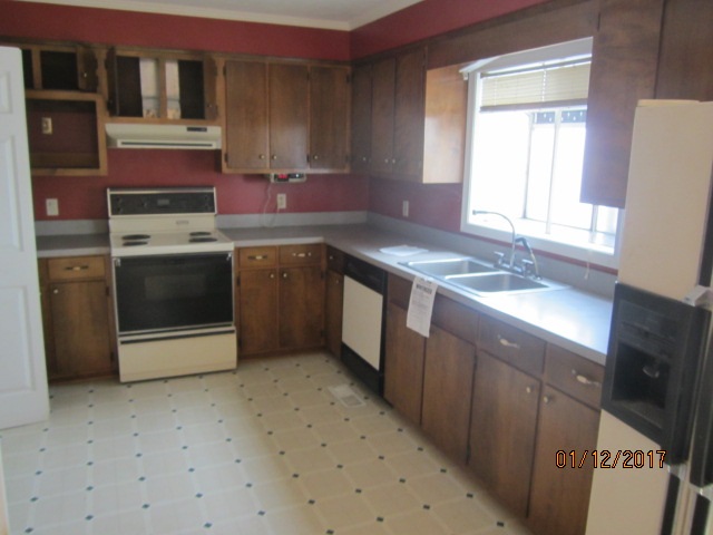 760 Buttermilk Spring Road Staunton, VA 24401 - Photo 5 of 20 a kitchen with stainless steel appliances granite countertop a sink stove and refrigerator