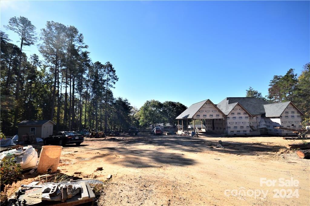 6506 Pargo Road Charlotte, NC 28216 - Photo 2 of 13 a view of house with snow on the road