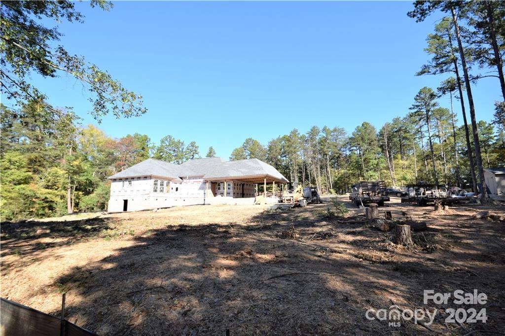 6506 Pargo Road Charlotte, NC 28216 - Photo 3 of 13 a view of a house with a yard