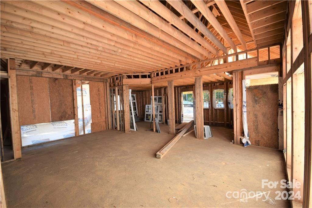 6506 Pargo Road Charlotte, NC 28216 - Photo 6 of 13 a view of a hall with wooden floors