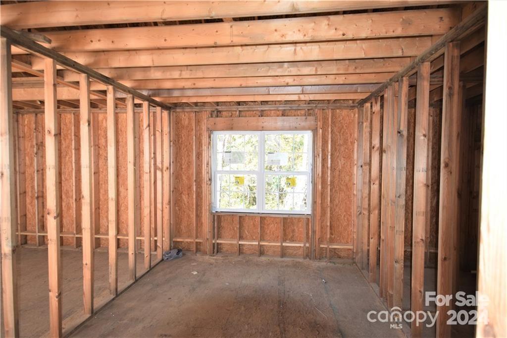 6506 Pargo Road Charlotte, NC 28216 - Photo 8 of 13 a view of an empty room with a window