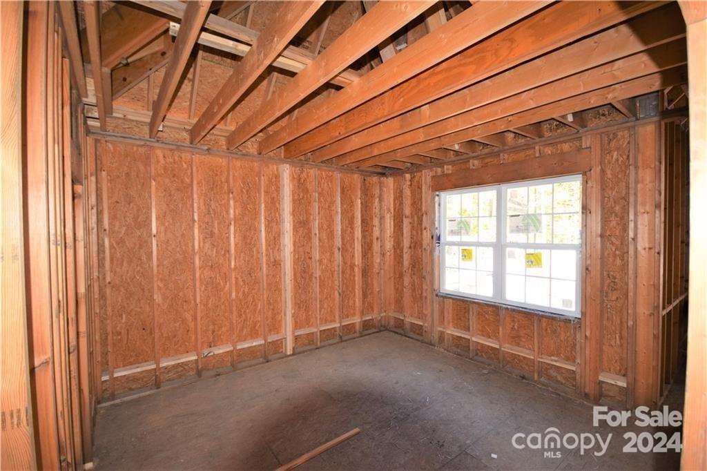 6506 Pargo Road Charlotte, NC 28216 - Photo 10 of 13 a view of an empty room with a window