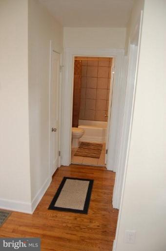28 Crafton Road Essex, MD 21221 - Photo 11 of 13 a view of a hardwood floor and staircase