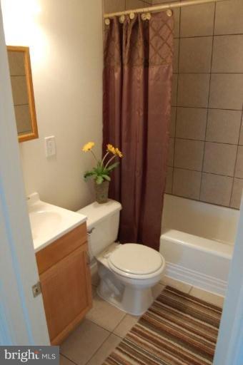 28 Crafton Road Essex, MD 21221 - Photo 13 of 13 a white toilet sitting next to a bath tub