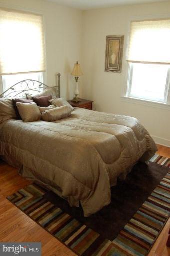 28 Crafton Road Essex, MD 21221 - Photo 7 of 13 a bedroom with a bed and window